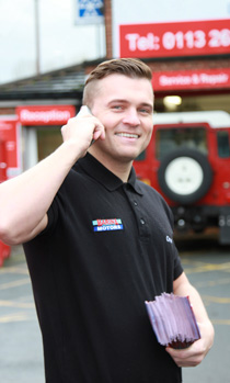 Image of customer and motor mechanic